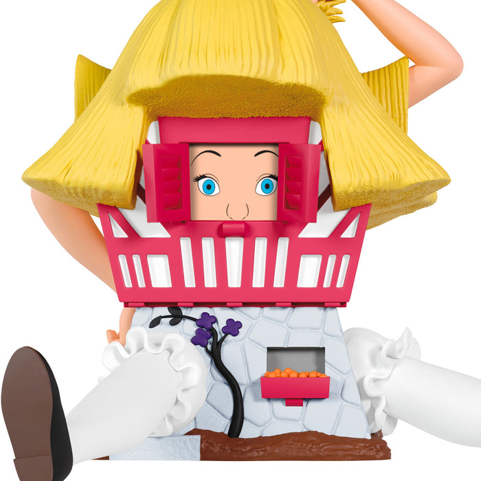Toy figure of a character with a yellow hat and pink basket on a white background