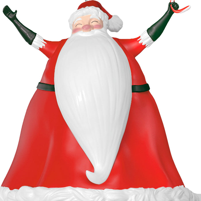 Inflatable Santa Claus figure with arms outstretched on a white background