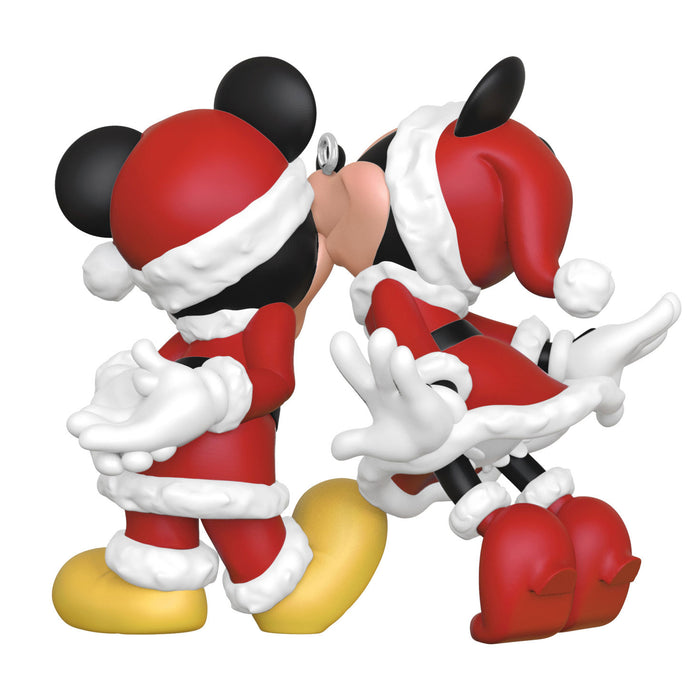 Santa Mickey Mouse figurine on a white background