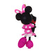Toy figure of a character in a pink dress with white polka dots on a white background