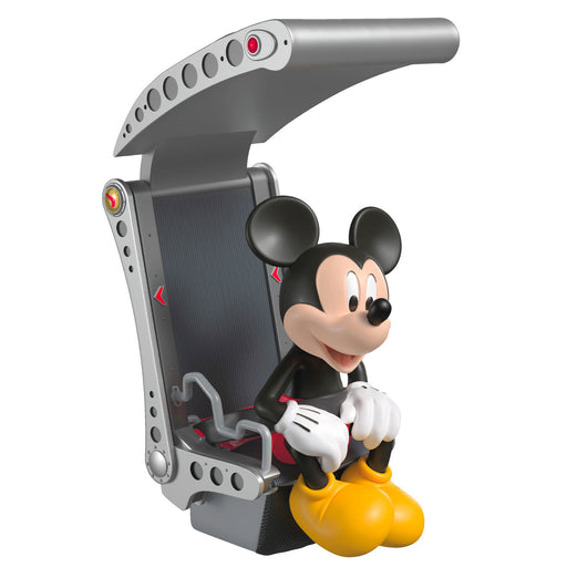 Toy figure of a character in a futuristic vehicle on a white background