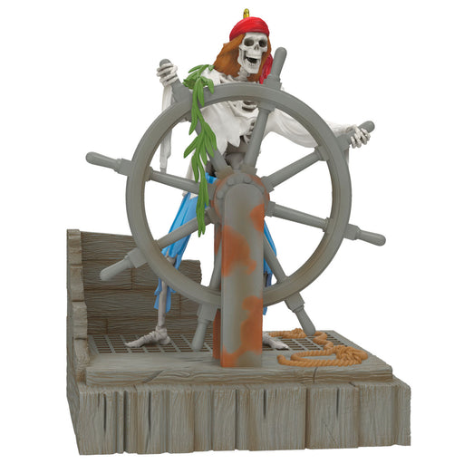 Pirate skeleton figure on a ship's wheel with a white background