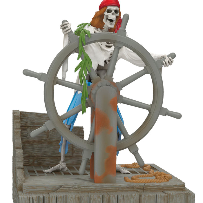 Pirate skeleton figure on a ship's wheel with a white background