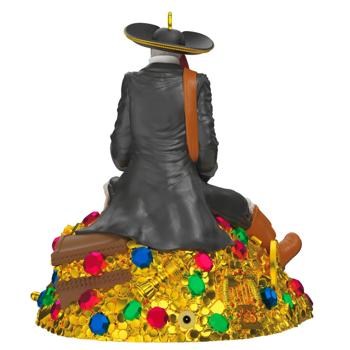 Statue of a person in formal attire with a colorful base on a white background