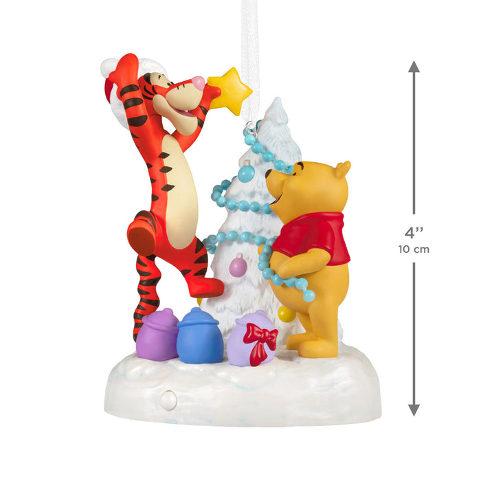 Figurine of Winnie the Pooh and Tigger decorating a white tree with measurements indicated.