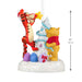 Figurine of Winnie the Pooh and Tigger decorating a white tree with measurements indicated.