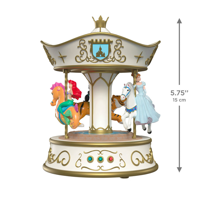 Decorative carousel figurine with characters on a white background