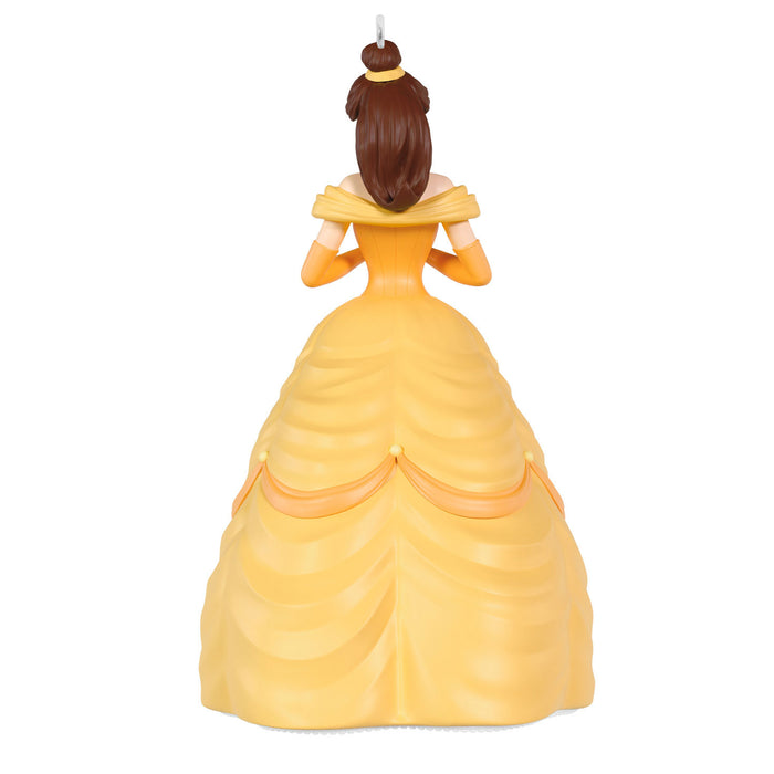 Figurine of a character in a yellow dress on a white background