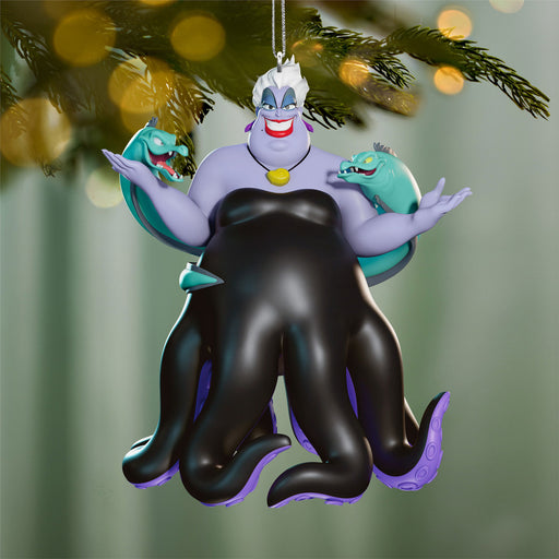 Ornament of Ursula from Disney's 'The Little Mermaid' hanging on a Christmas tree.