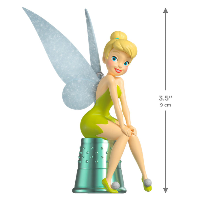Tinker Bell figurine with wings on a white background