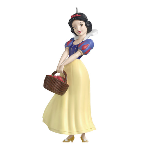 Snow White figurine holding a basket on a white background