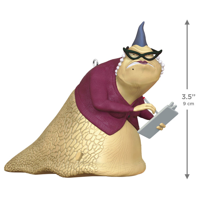 Animated character figurine with a purple sweater and glasses, holding a clipboard, on a white background.