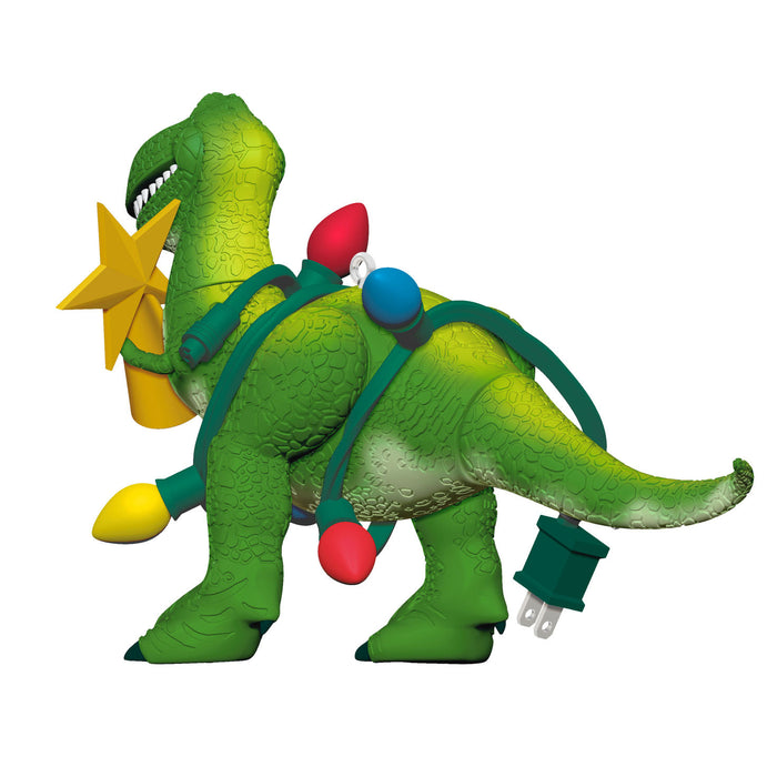 Toy dinosaur with Christmas decorations on a white background