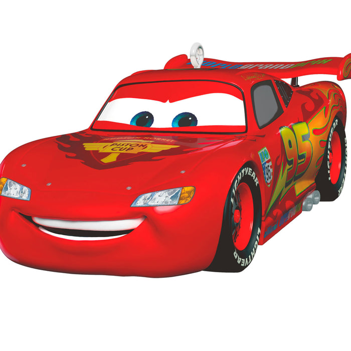 Red animated car with blue eyes on a white background