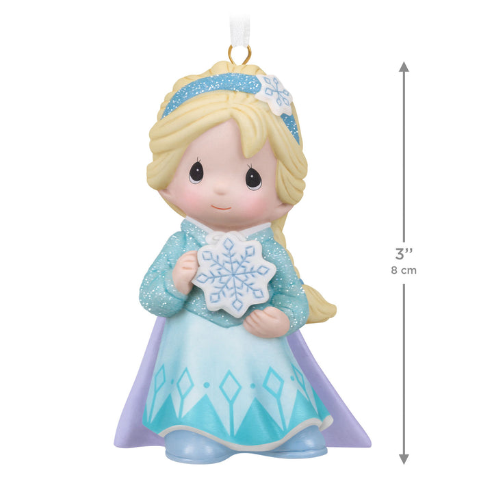 Decorative figurine of a princess holding a snowflake, with measurements indicated.