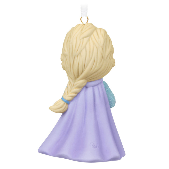 Ornament of a character with braided hair and a purple dress on a white background
