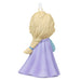 Ornament of a character with braided hair and a purple dress on a white background