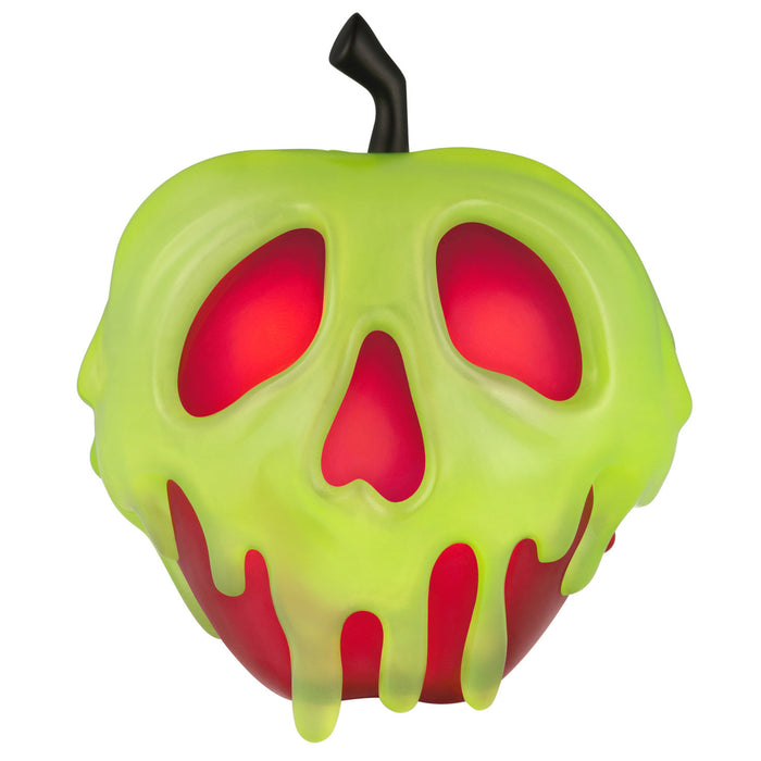 Toy apple with glowing red interior on a white background