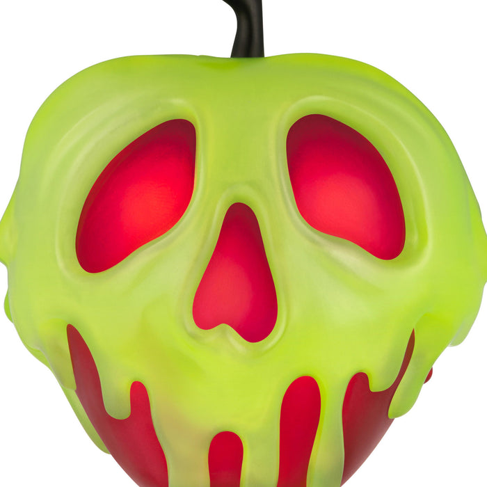 Green apple-shaped object with red interior on a white background