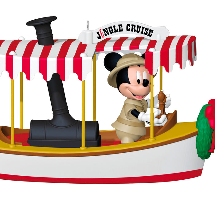 Decorative ornament of a boat with a character on it, featuring 'Jungle Cruise' text.