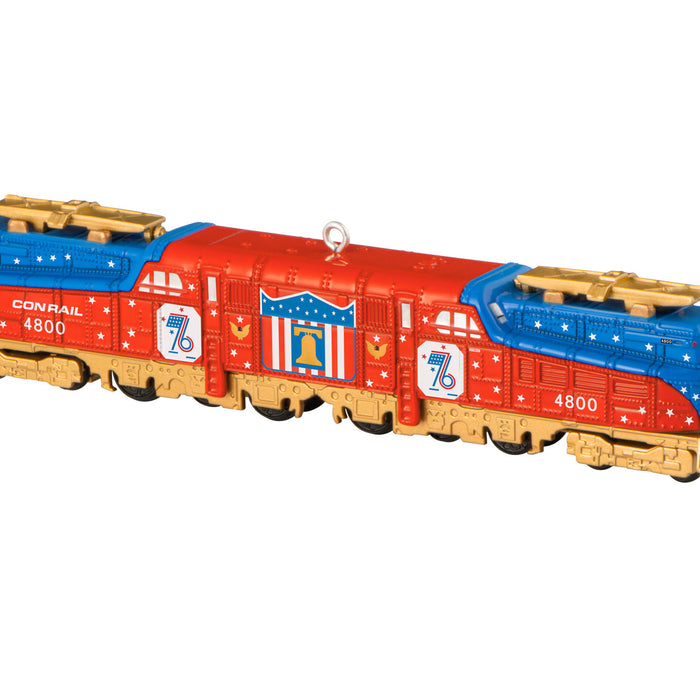 Toy train with red, blue, and yellow colors on a white background