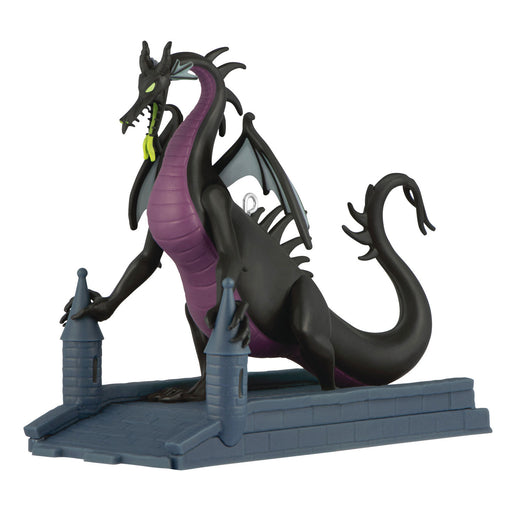 Dragon figurine with purple accents on a white background