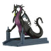 Dragon figurine with purple accents on a white background