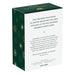 Box packaging for a keepsake ornament with green and gold decorative elements.