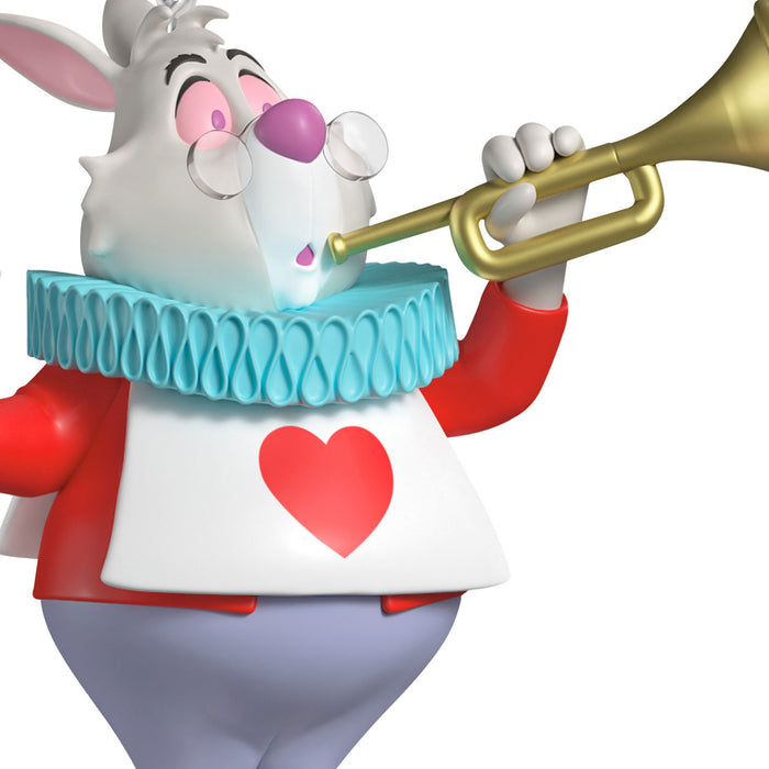 Animated character with a red heart on a white shirt, holding a gold trumpet.