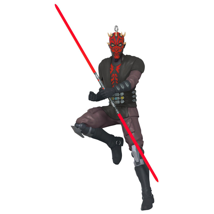 Action figure of a character from a popular franchise with a red lightsaber on a white background