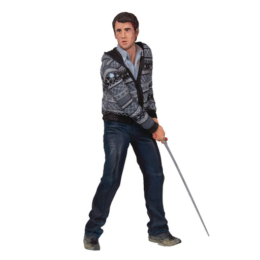 Action figure of a character holding a sword on a white background