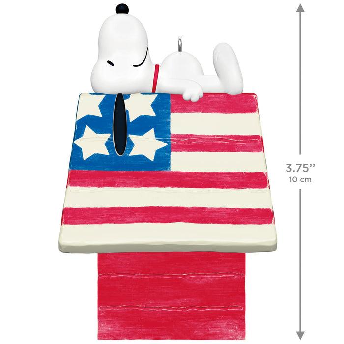 Snoopy figurine on an American flag doghouse with dimensions indicated