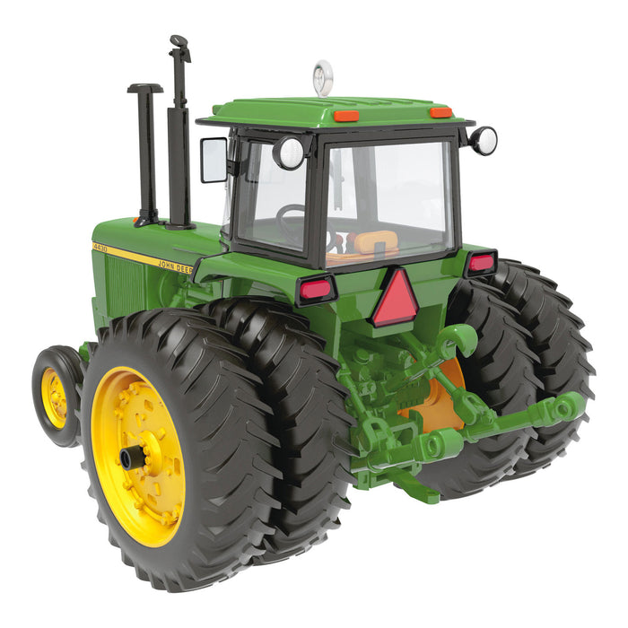 Toy tractor model on a white background