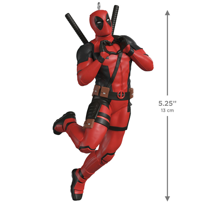 Deadpool action figure with measurement details on a white background