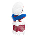 Spider-Man figurine climbing a brick wall with a golf ball on top