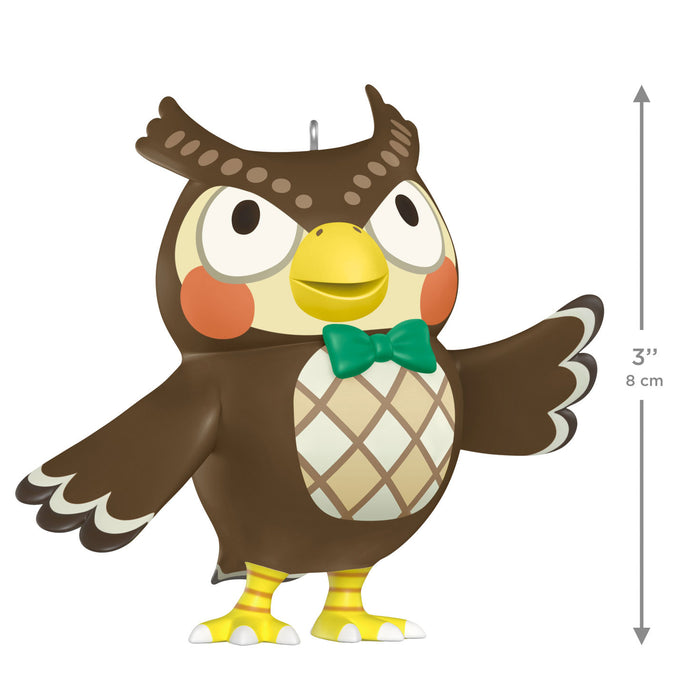 Cartoon owl figurine with a green bow tie and measurement details on a white background