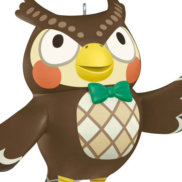 Cartoon owl character with a green bow tie on a white background