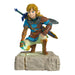 Figure of a character from a fantasy video game on a white background