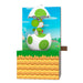 Toy figure of a green dinosaur-like character in an egg on a yellow platform with a blue sky background