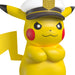 Pikachu figurine wearing a captain's hat on a white background