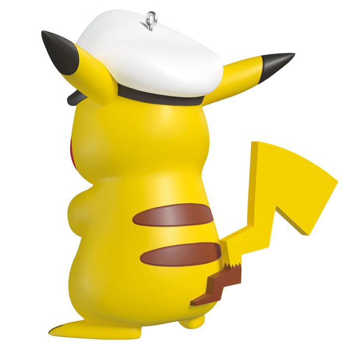 Yellow cartoon character with a white hat and black ears on a white background