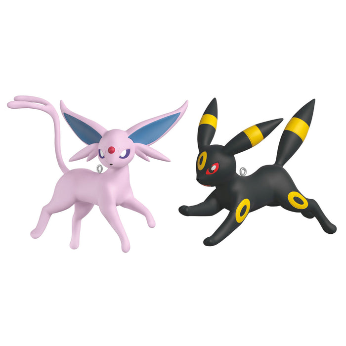Two cartoon-like figures, one pink and one black with yellow accents, on a white background.