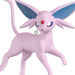 Pink creature with large ears and a red button on a white background