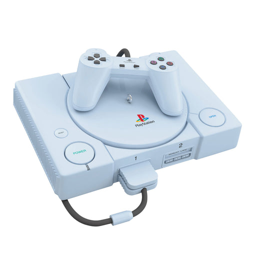 White PlayStation console with controller ornament on a white background