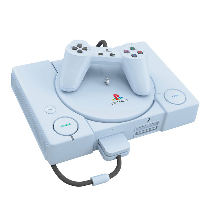 White PlayStation console with controller ornament on a white background