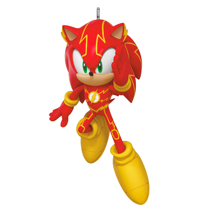 Toy figure of a character with red and yellow design on a white background