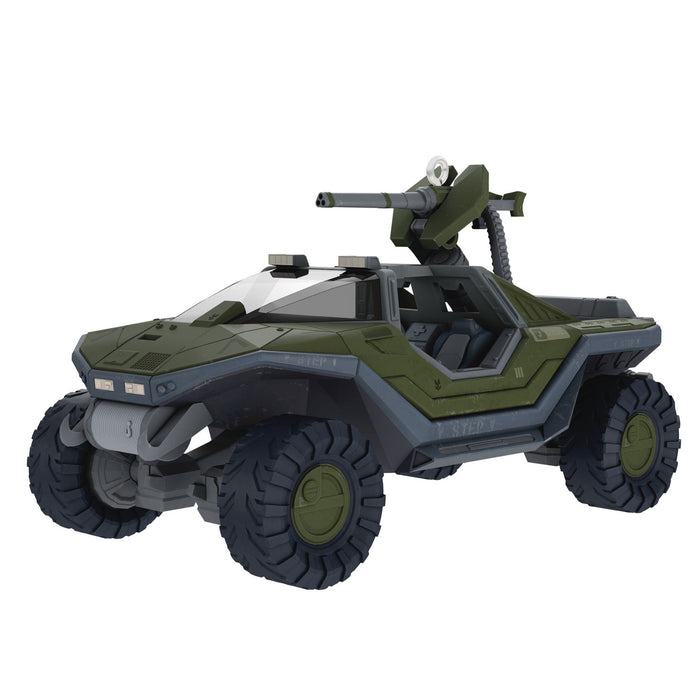 Toy vehicle with green and gray color scheme on a white background