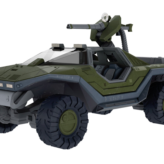 Toy vehicle ornament with green and gray color scheme on a white background