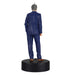 Statue of a person in a blue suit on a black base with a white background