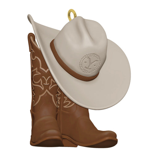 Decorative ornament with cowboy hat and boots on a white background